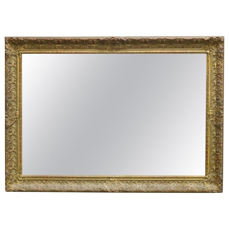 Antique Continental Scroll and Foliate Giltwood Framed Wall Mirror, circa 1900