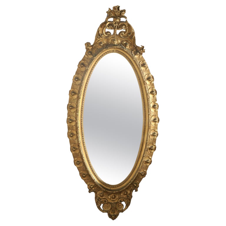 Oversized Gold Giltwood Oval Parlor Mirror with Foliate & Floral Crest C1890