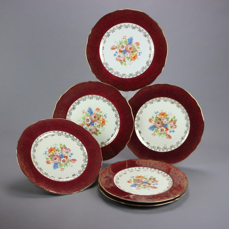 Six Atlas Burgundy & Gilt Rim China Dinner Plates with Floral Well