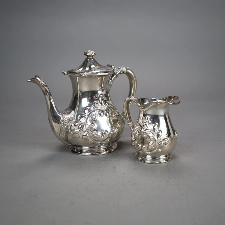 Two Piece Antique Silver Plated Tea Set with Foliate Engraving C1890