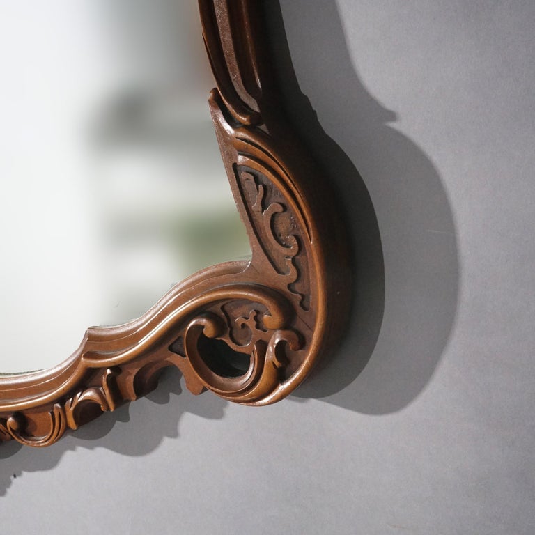 Antique Pair of French Louis XIV Style Carved Mahogany Mirrors, circa 1930