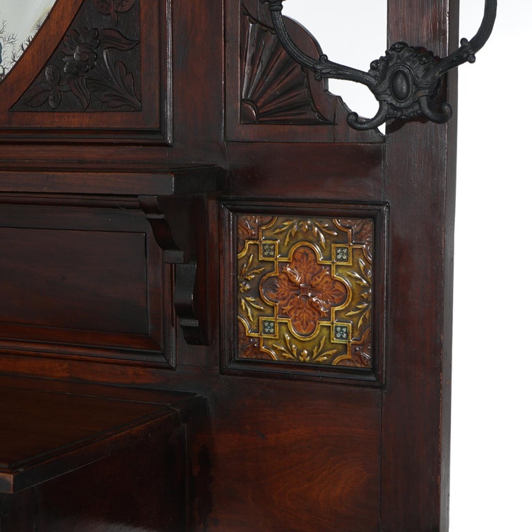 Antique Carved Mahogany Hall Tree with Decorative Tile And Mirror C1900