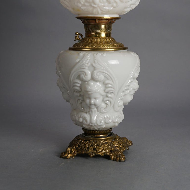 Antique Blanc De Chine Brass & Bronze Cupid Oil Lamp with Blown Out Glass c1900