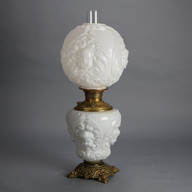Antique Blanc De Chine Brass & Bronze Cupid Oil Lamp with Blown Out Glass c1900