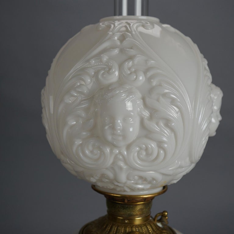 Antique Blanc De Chine Brass & Bronze Cupid Oil Lamp with Blown Out Glass c1900