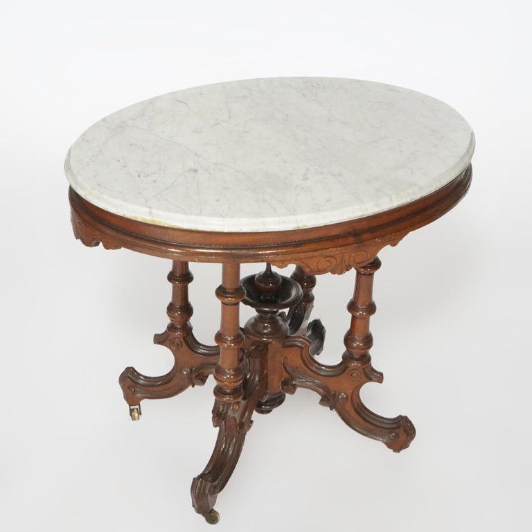 Antique Renaissance Revival Walnut Oval Marble Top Parlor Table, circa 1890