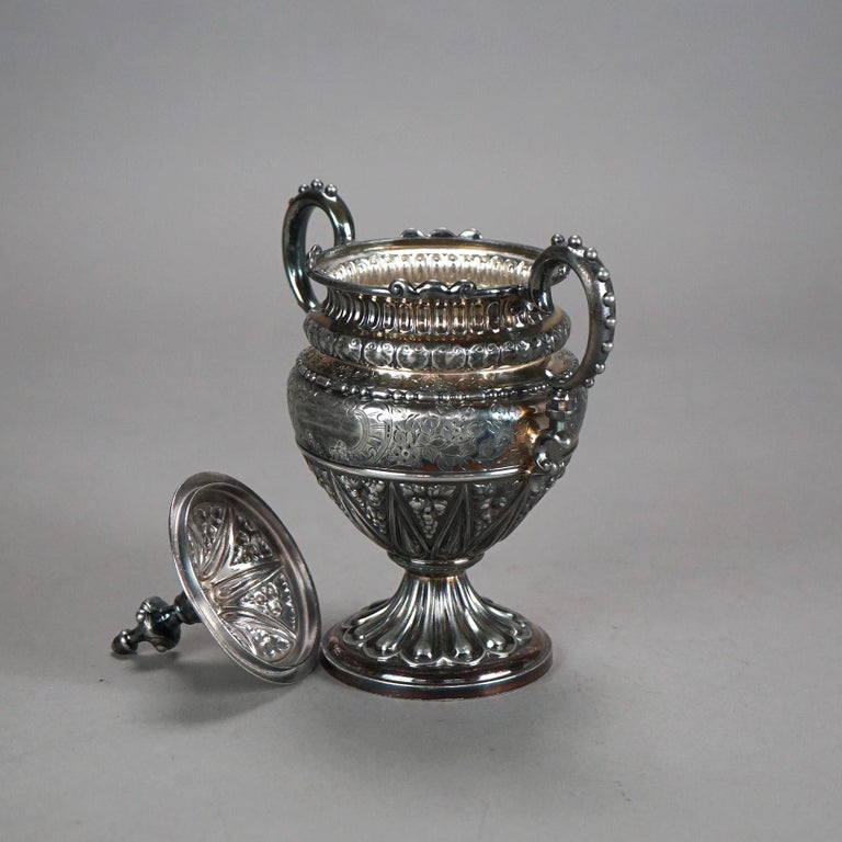 Three Piece Antique Silver Plated Tea Set with Foliate Engraving C1890