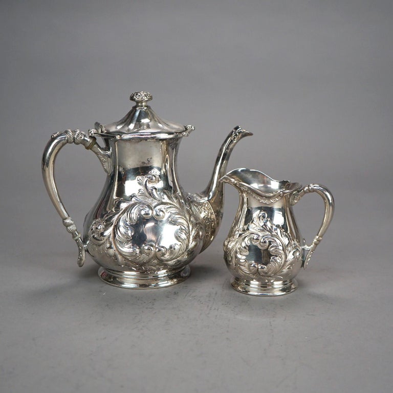 Two Piece Antique Silver Plated Tea Set with Foliate Engraving C1890