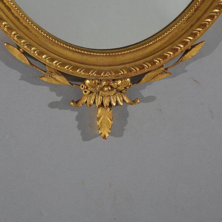 Large Giltwood Oval Wall Mirror with Floral, Foliate & Scroll Elements 20thC