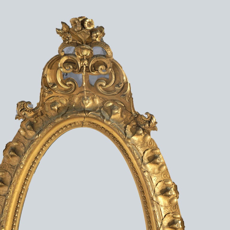 Oversized Gold Giltwood Oval Parlor Mirror with Foliate & Floral Crest C1890