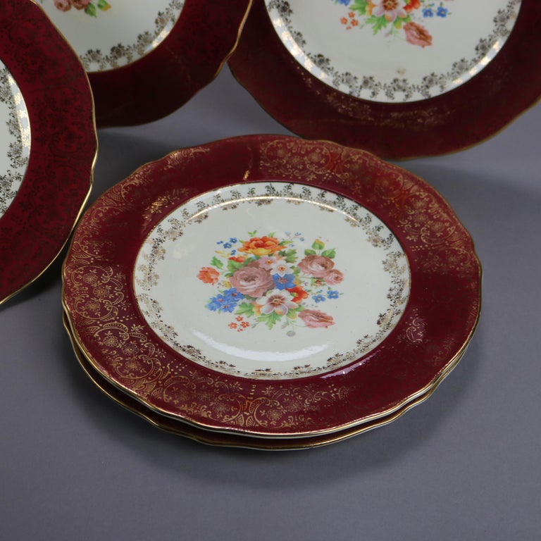Six Atlas Burgundy & Gilt Rim China Dinner Plates with Floral Well