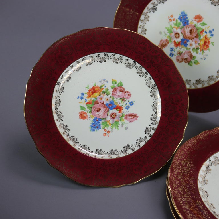 Six Atlas Burgundy & Gilt Rim China Dinner Plates with Floral Well