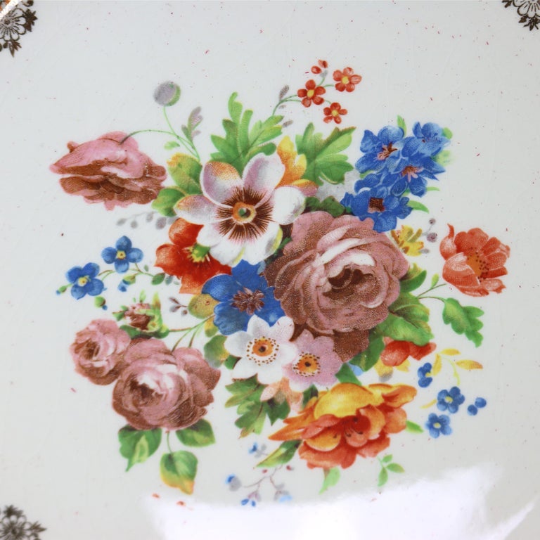 Six Atlas Burgundy & Gilt Rim China Dinner Plates with Floral Well