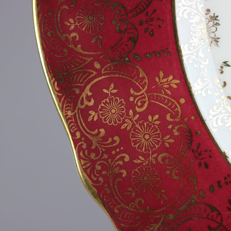 Six Atlas Burgundy & Gilt Rim China Dinner Plates with Floral Well