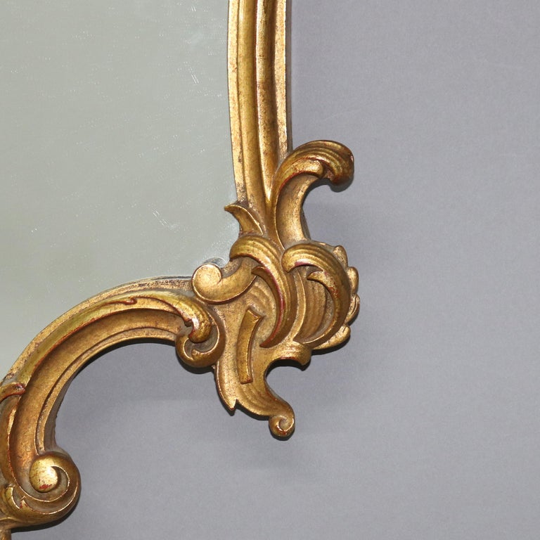Antique Louis XIV Style Giltwood Shield Form Mirror with Foliate Elements C1930