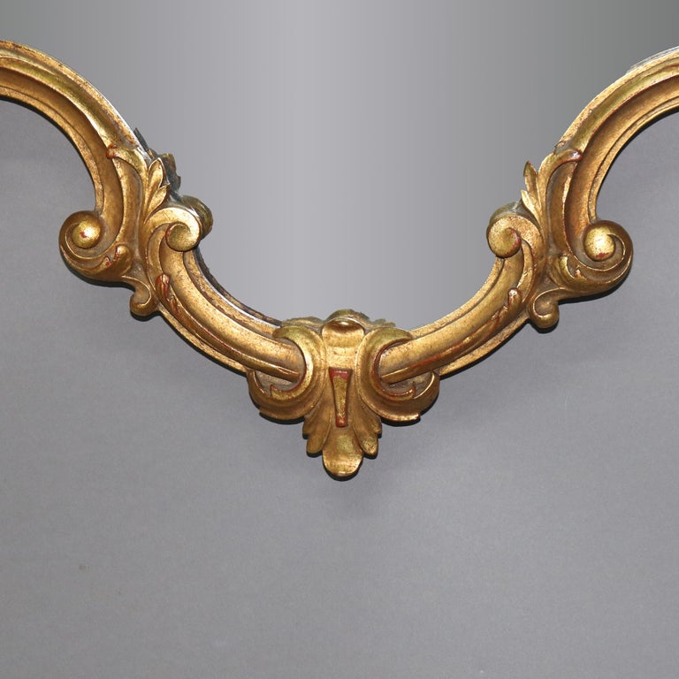 Antique Louis XIV Style Giltwood Shield Form Mirror with Foliate Elements C1930