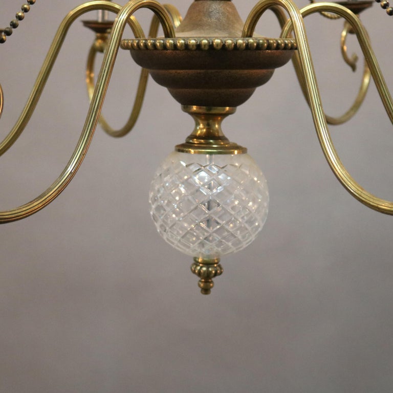 Vintage French Nine-Light Tiered Brass and Crystal Chandelier, 20th Century