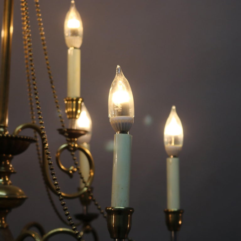 Vintage French Nine-Light Tiered Brass and Crystal Chandelier, 20th Century