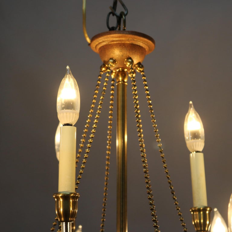 Vintage French Nine-Light Tiered Brass and Crystal Chandelier, 20th Century