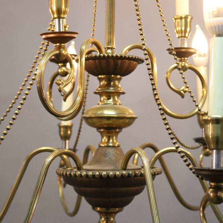 Vintage French Nine-Light Tiered Brass and Crystal Chandelier, 20th Century