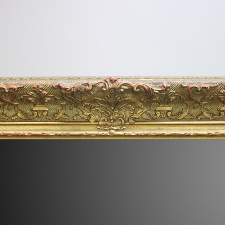 Antique Continental Scroll and Foliate Giltwood Framed Wall Mirror, circa 1900