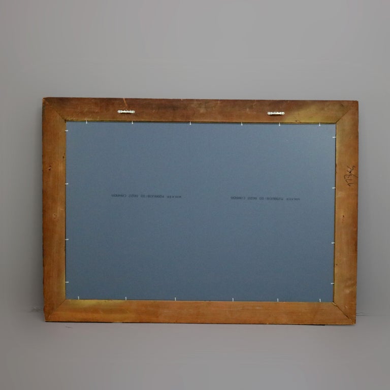 Antique Continental Scroll and Foliate Giltwood Framed Wall Mirror, circa 1900