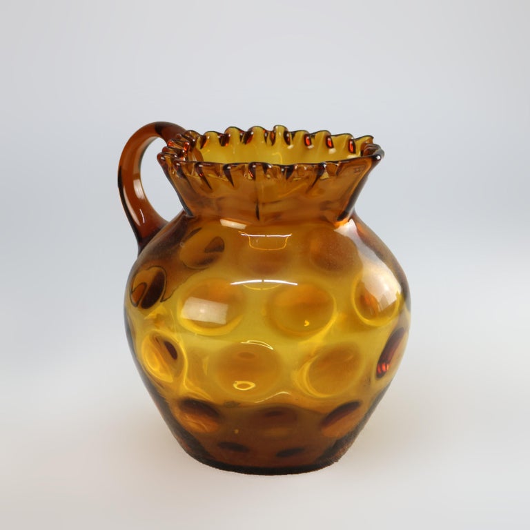 Amber Coinspot Amber Glass Juice Pitcher with Ruffled Rim 20thC