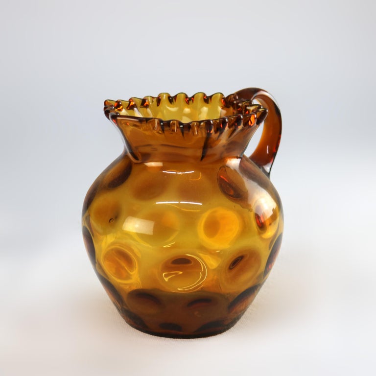 Amber Coinspot Amber Glass Juice Pitcher with Ruffled Rim 20thC