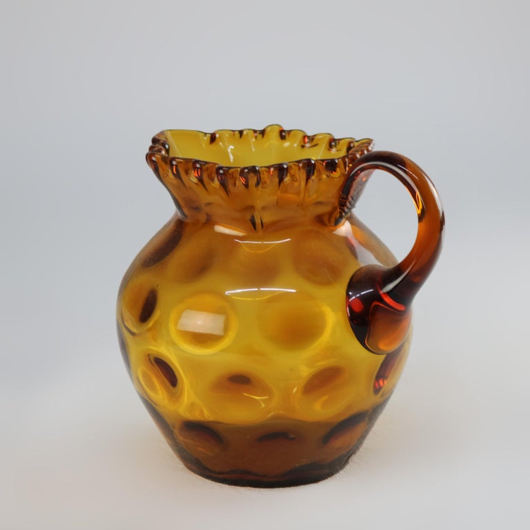 Amber Coinspot Amber Glass Juice Pitcher with Ruffled Rim 20thC