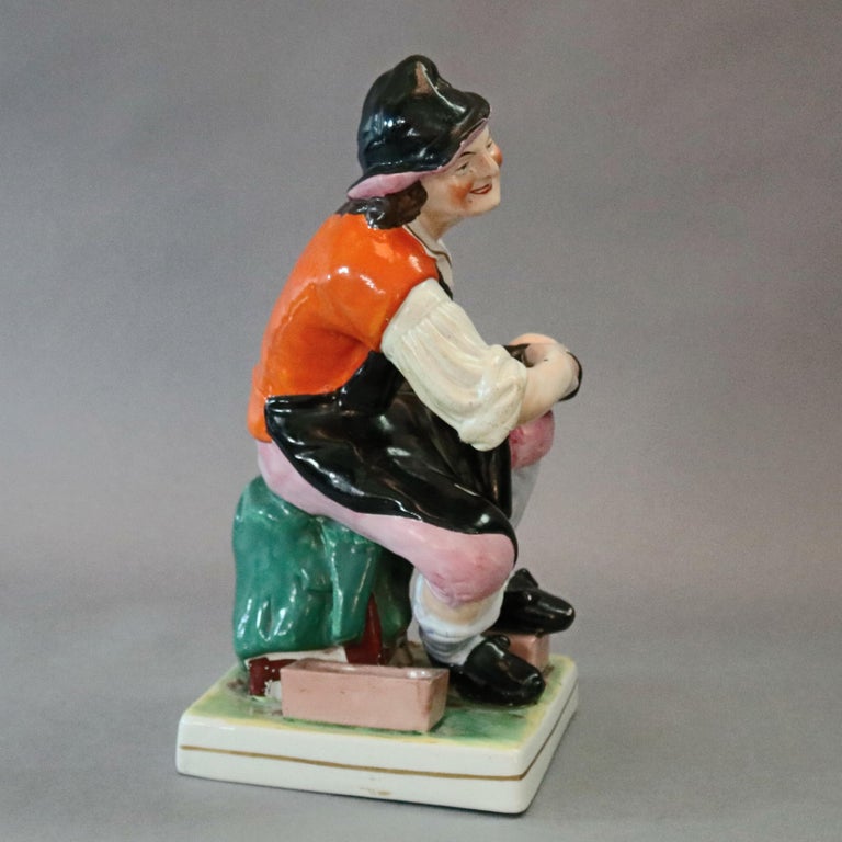 Antique English Staffordshire Hand Painted Figural Porcelain Cobbler, circa 1860