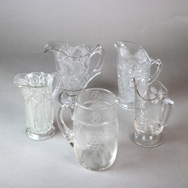 Five Antique Etched and Pressed Glass Water Pitchers 19thC
