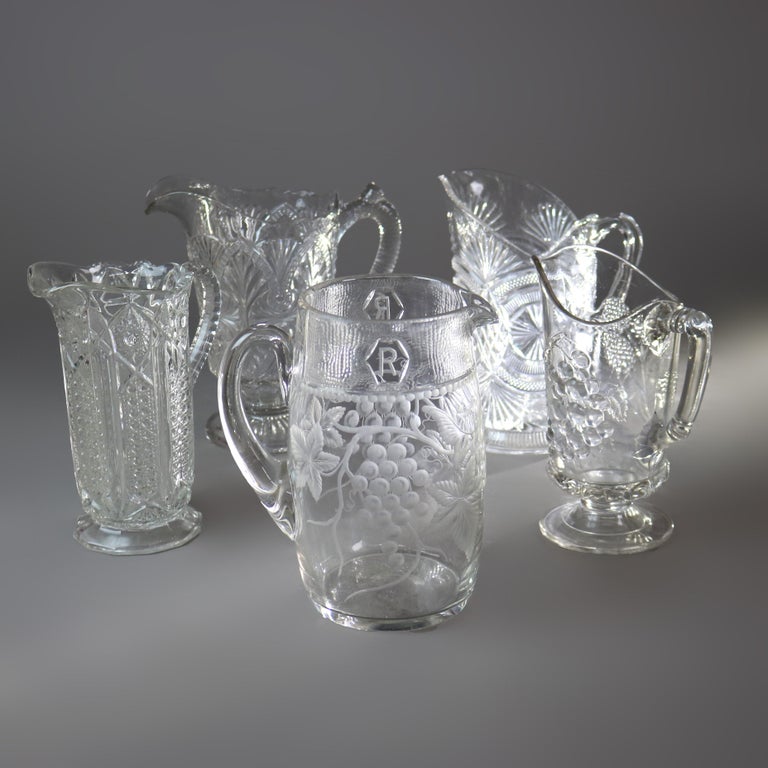 Five Antique Etched and Pressed Glass Water Pitchers 19thC