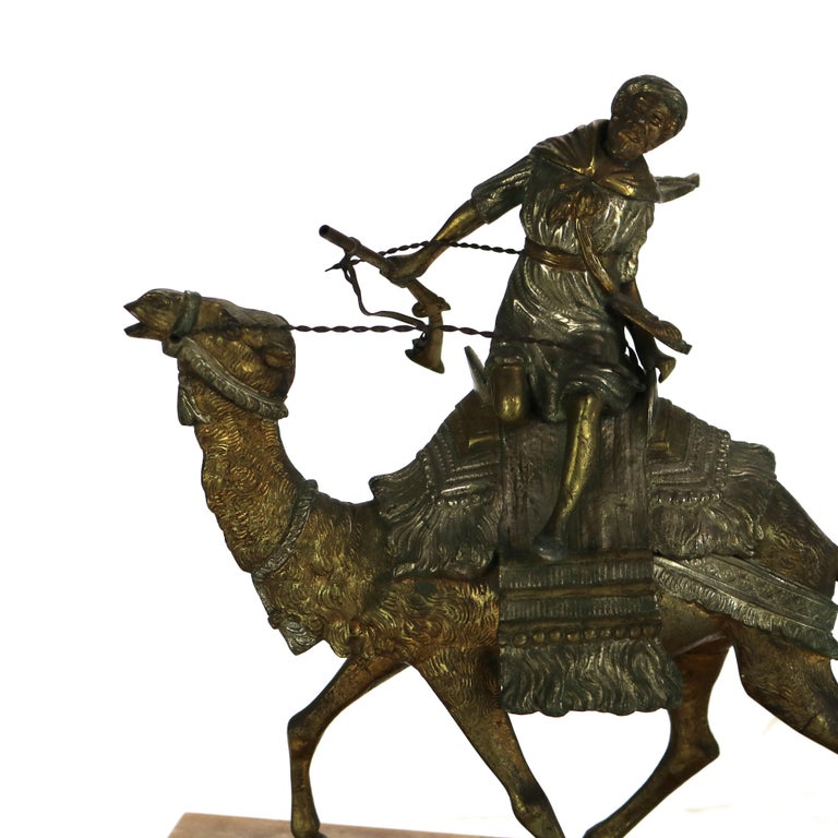 Antique Egyptian Revival Silver & Gilt Finished Sculpture of Camel & Rider C1900
