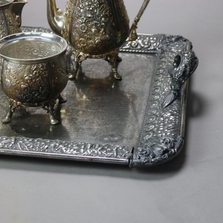 Six-Piece Antique Silver Plated Floral Repousse Tea Set C1890