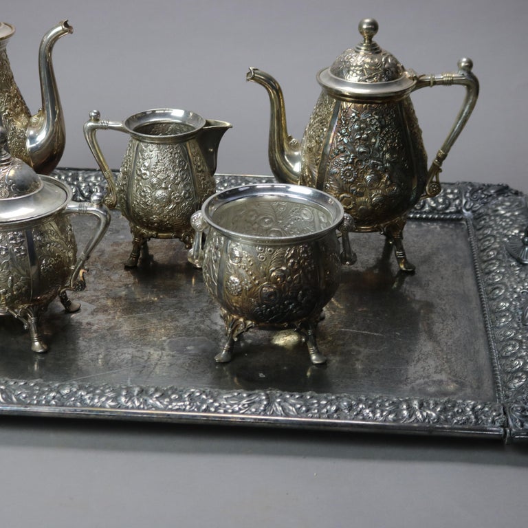 Six-Piece Antique Silver Plated Floral Repousse Tea Set C1890