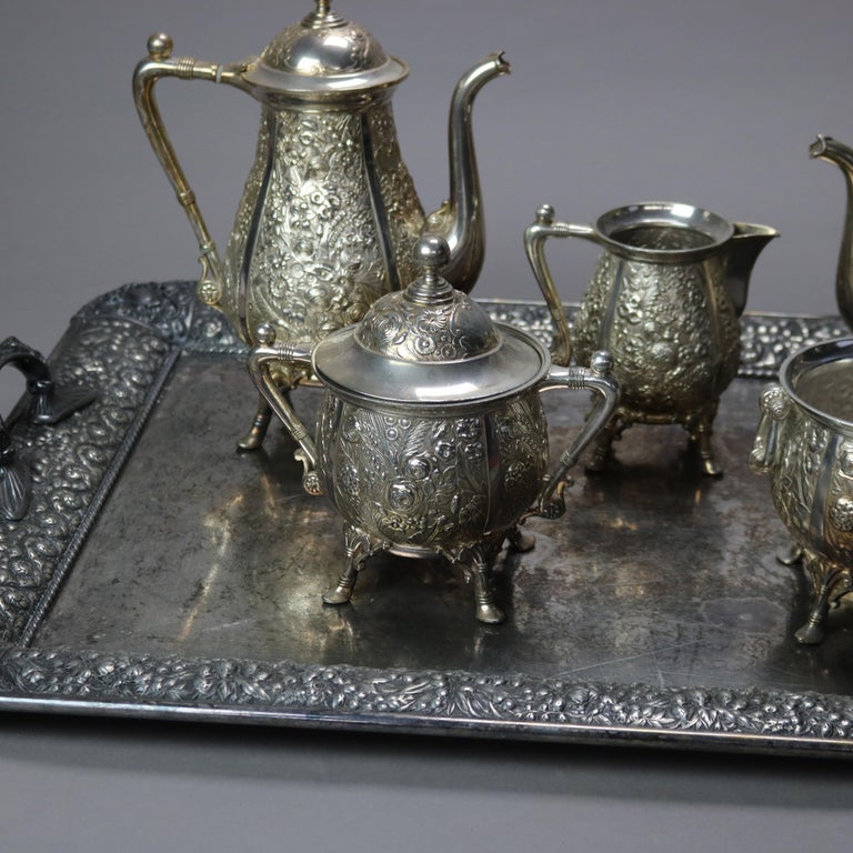 Six-Piece Antique Silver Plated Floral Repousse Tea Set C1890