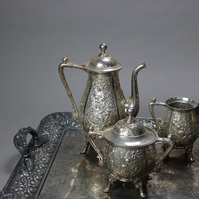 Six-Piece Antique Silver Plated Floral Repousse Tea Set C1890