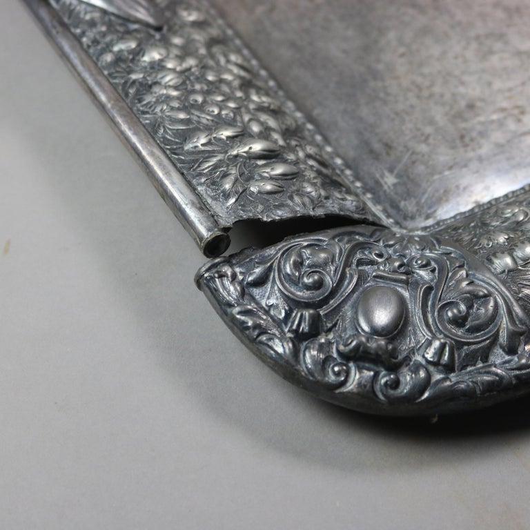 Six-Piece Antique Silver Plated Floral Repousse Tea Set C1890