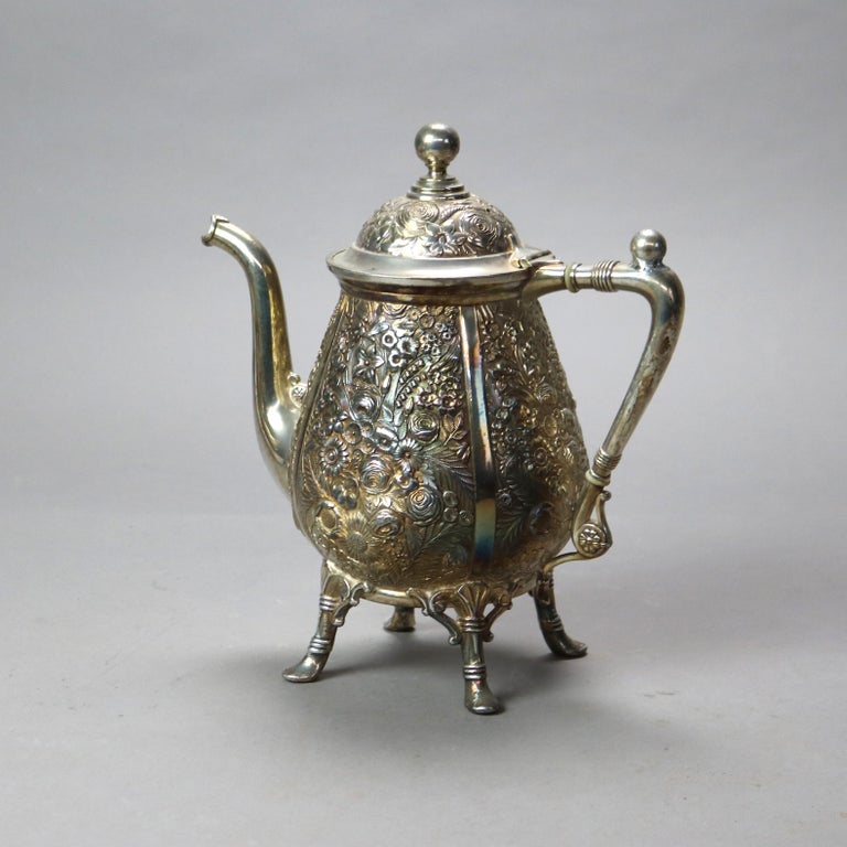 Six-Piece Antique Silver Plated Floral Repousse Tea Set C1890