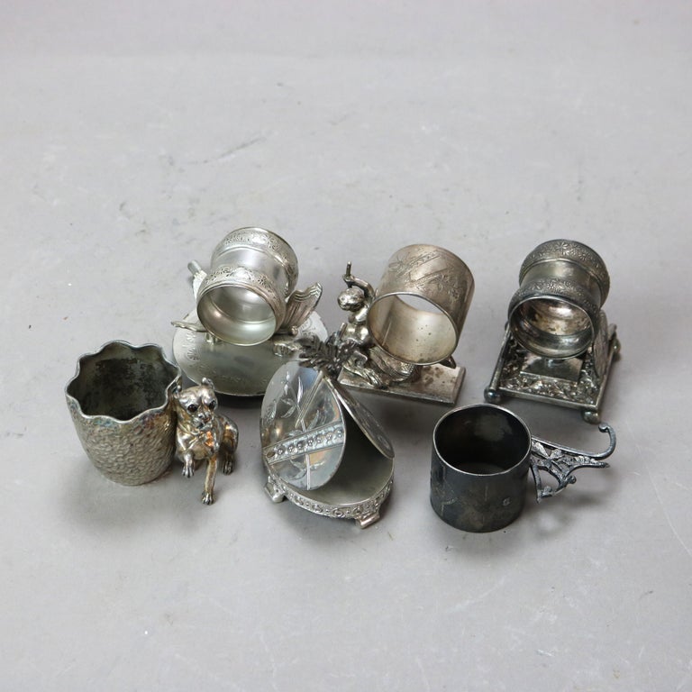 Six Miscellaneous Antique Aesthetic Movement Silver Plated Napkin Rings