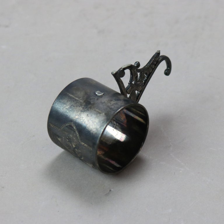 Six Miscellaneous Antique Aesthetic Movement Silver Plated Napkin Rings