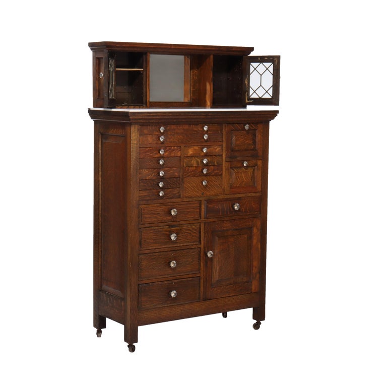 Arts & Crafts 18 Drawer Dental Cabinet with Oak, Leaded Glass & Porcelain C1910