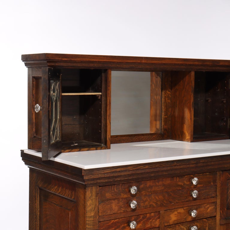 Arts & Crafts 18 Drawer Dental Cabinet with Oak, Leaded Glass & Porcelain C1910