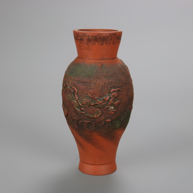 Nine Japanese Embossed Terra Cotta Vases C1930