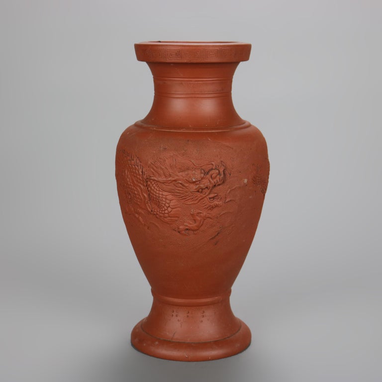 Nine Japanese Embossed Terra Cotta Vases C1930