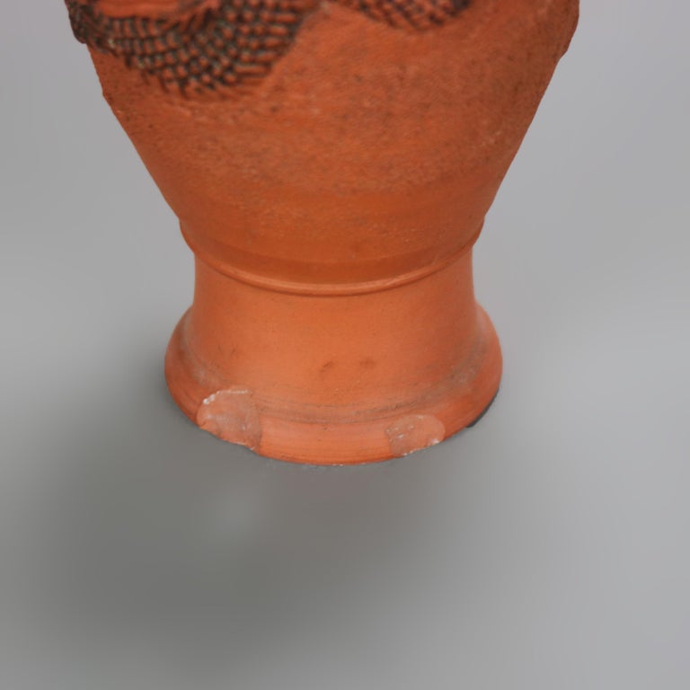 Nine Japanese Embossed Terra Cotta Vases C1930