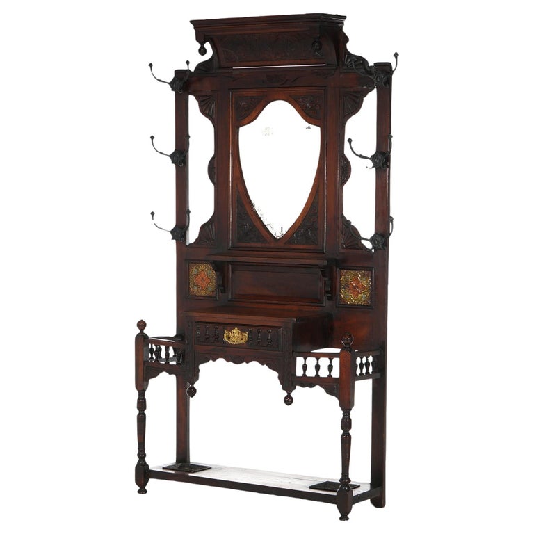 Antique Carved Mahogany Hall Tree with Decorative Tile And Mirror C1900
