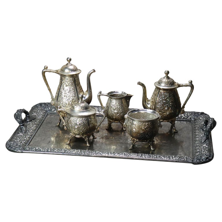 Six-Piece Antique Silver Plated Floral Repousse Tea Set C1890