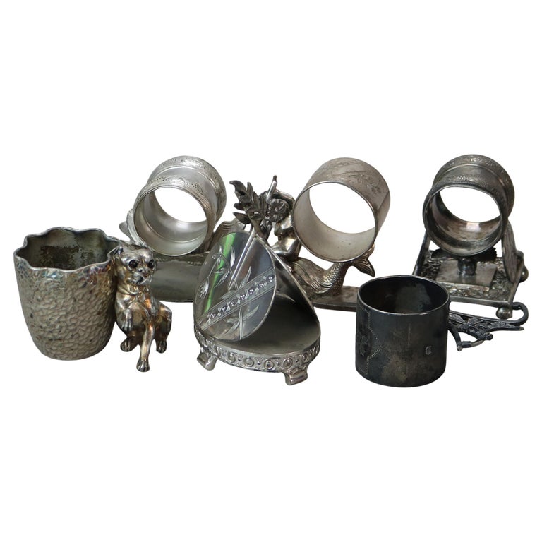 Six Miscellaneous Antique Aesthetic Movement Silver Plated Napkin Rings