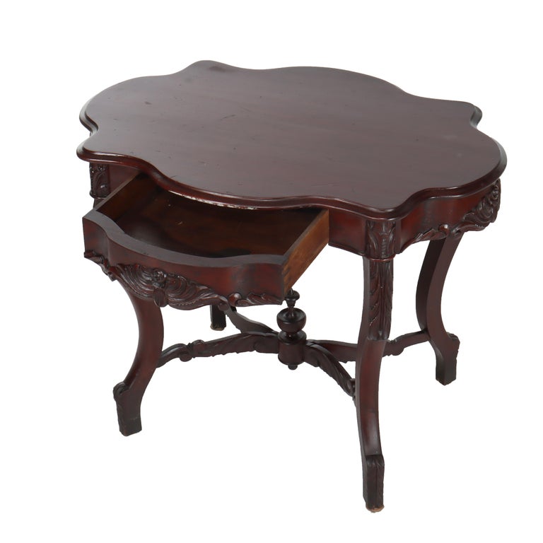 Antique Carved Flame Mahogany Turtle Top Table C1880